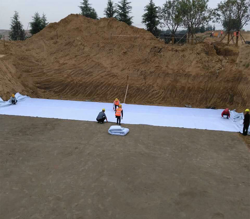 Lay a layer of 100mm thick fine sand, and Put the first layer of geotextile on the sand layer